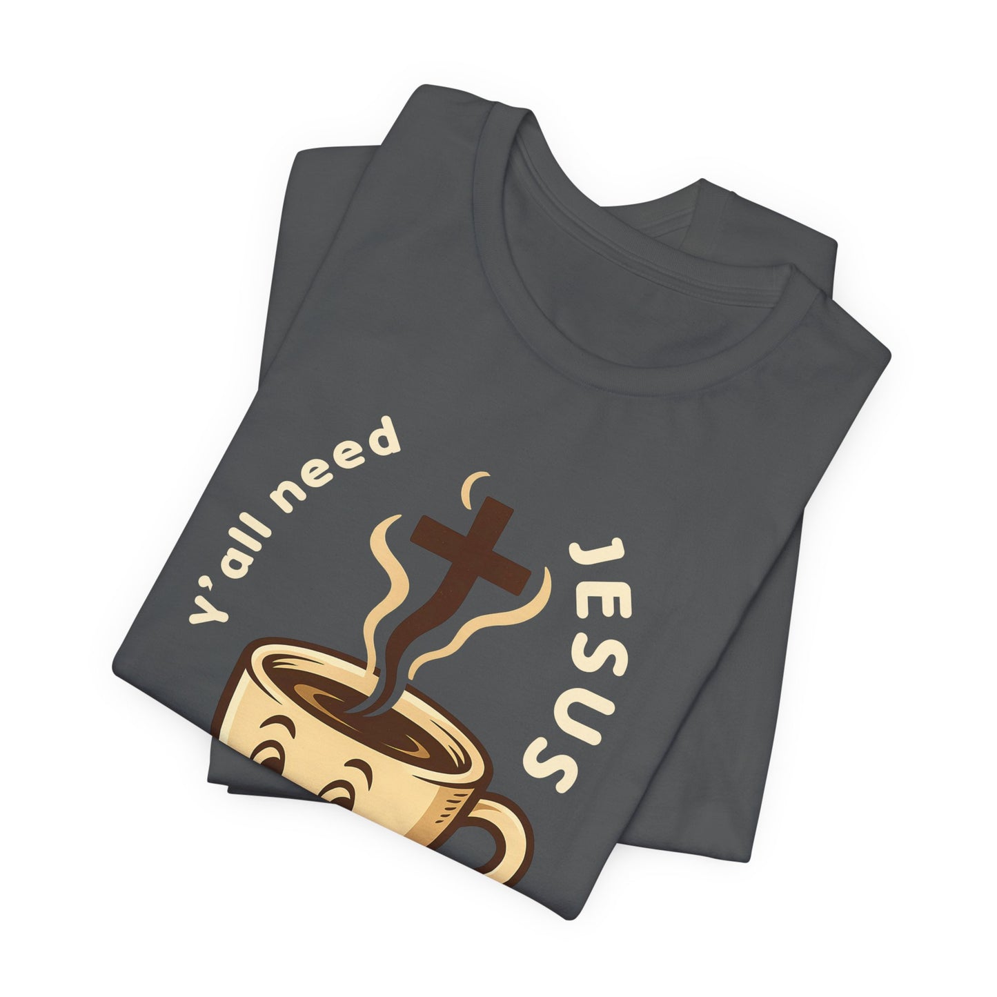 Dark gray t-shirt with a graphic design featuring a coffee cup and cross, text 'Y'all need Jesus', on a white background.