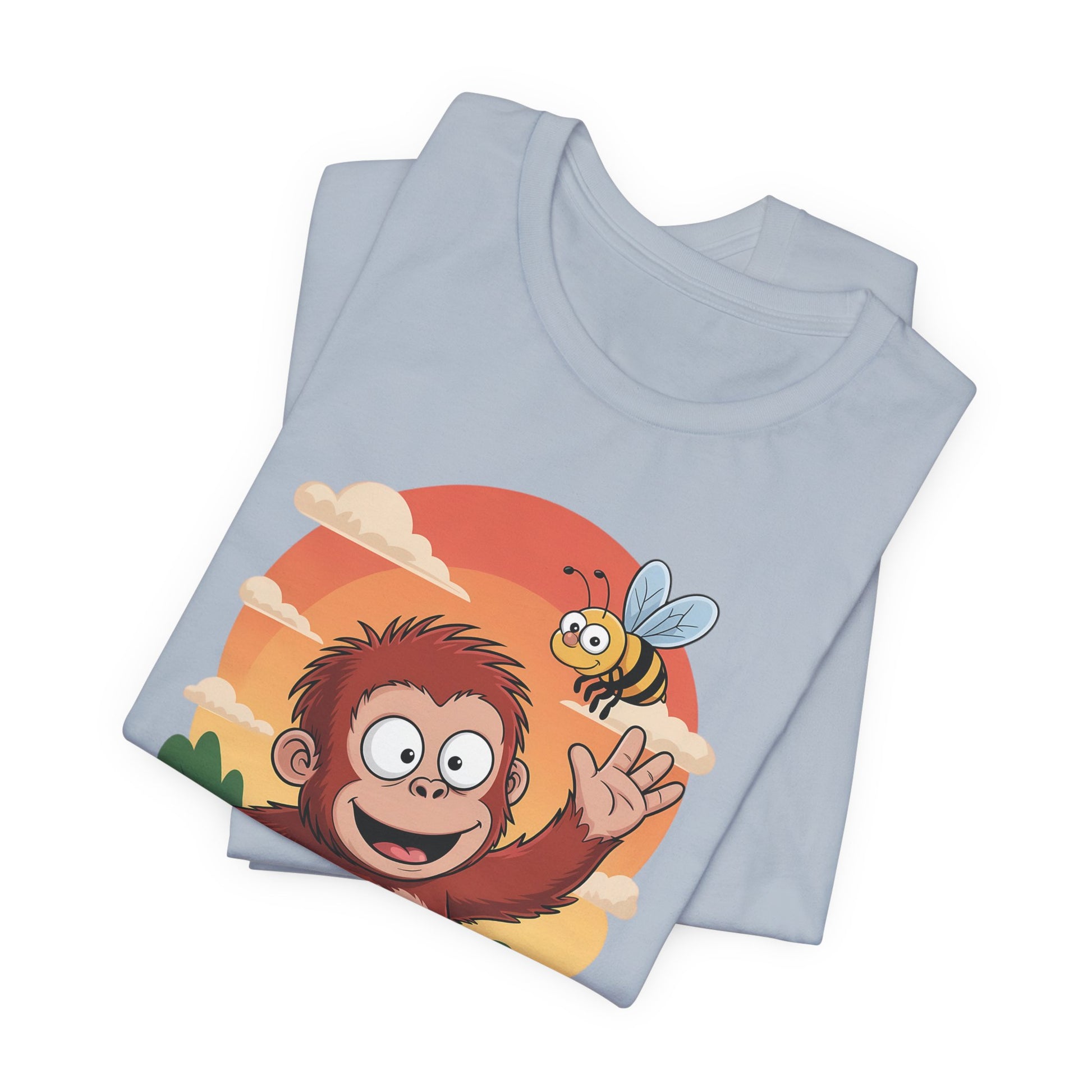 Light blue t-shirt with a cartoon monkey and bee design on a white background