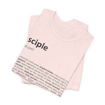 Folded pink tank top with 'sciple' branding on a white background