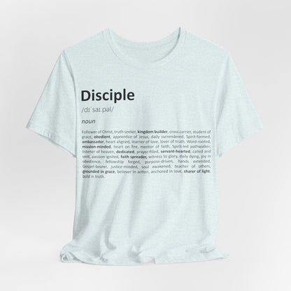 White t-shirt with black text on a light pink background