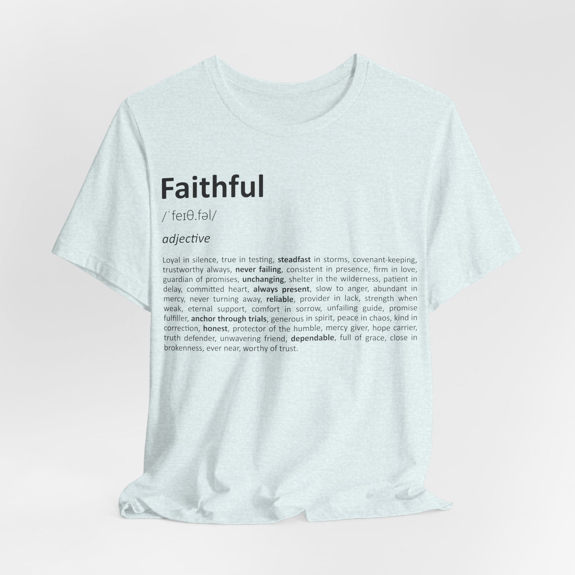 White t-shirt with black text on a light pink background