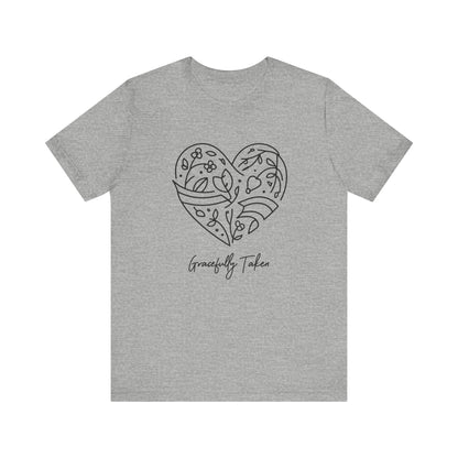 Gray t-shirt with a heart design and 'Gracefully Taken' text on a white background