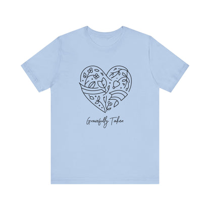 Light blue t-shirt with a heart design and text on a white background