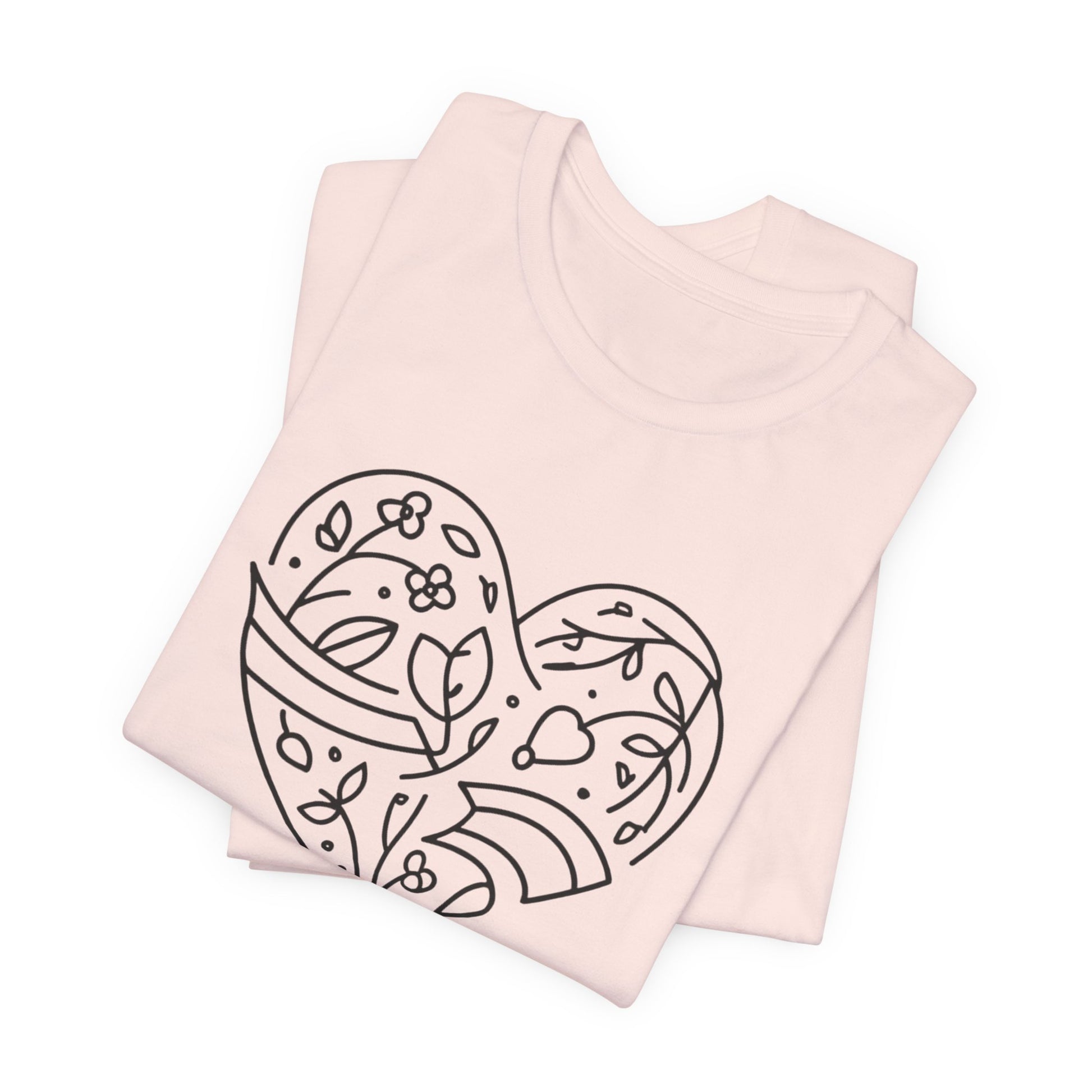 Light pink tank top with a black floral heart design on a white background
