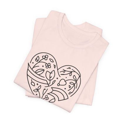 Light pink tank top with a black floral heart design on a white background