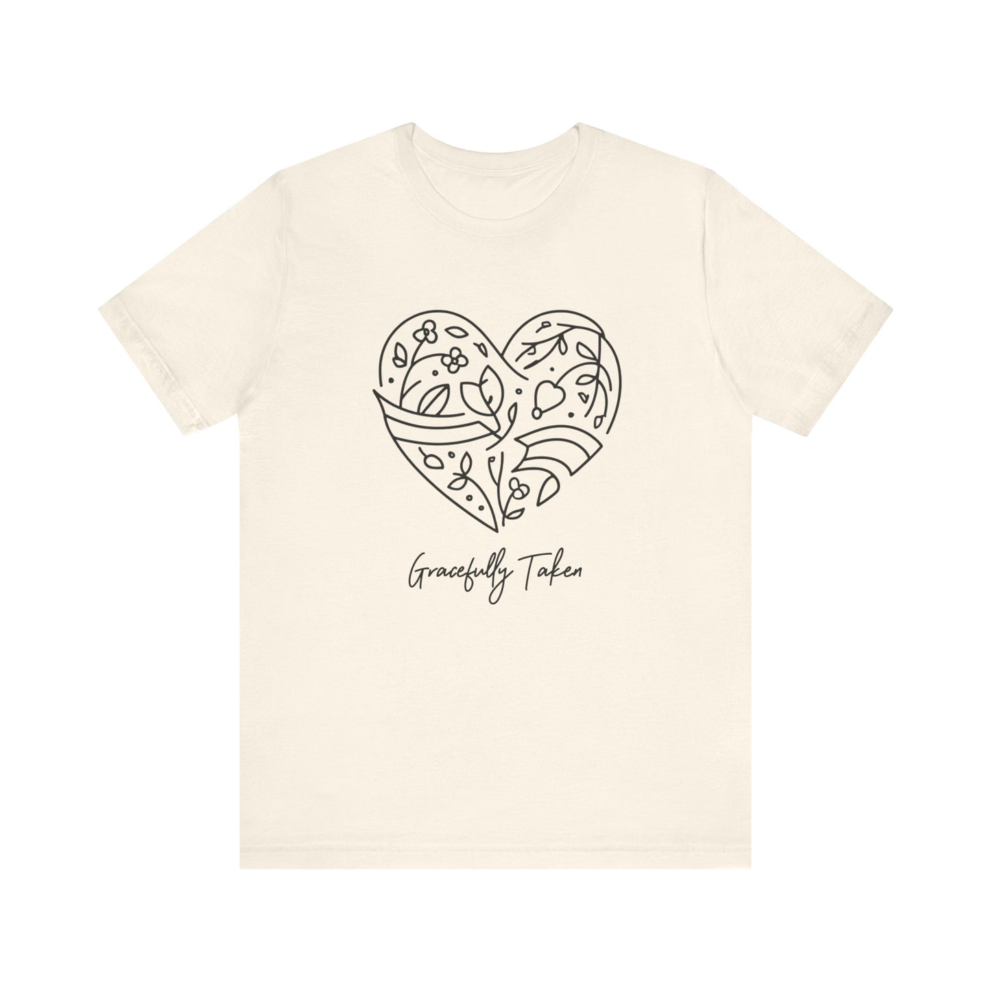 Beige t-shirt with a heart design and 'Gracefully Taken' text on a white background