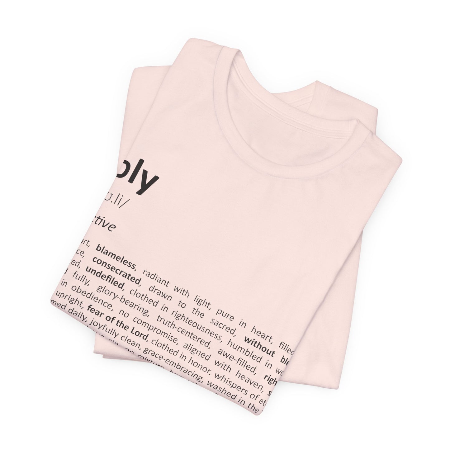 Folded pink tank top with text on a white background