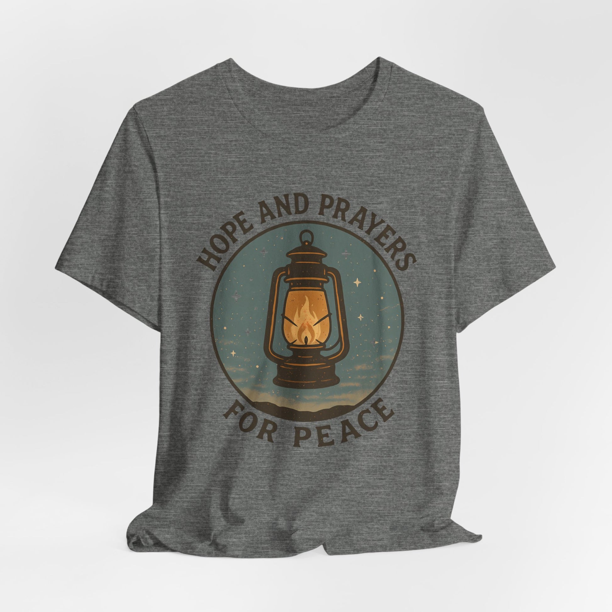 Gray t-shirt with a graphic of a lantern and text 'Hope and Prayers for Peace' on a white background