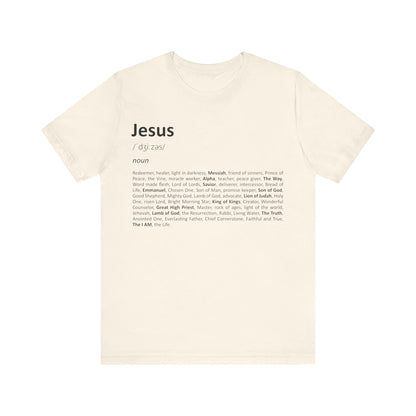 Beige t-shirt with text definition of 'Jesus' on a white background