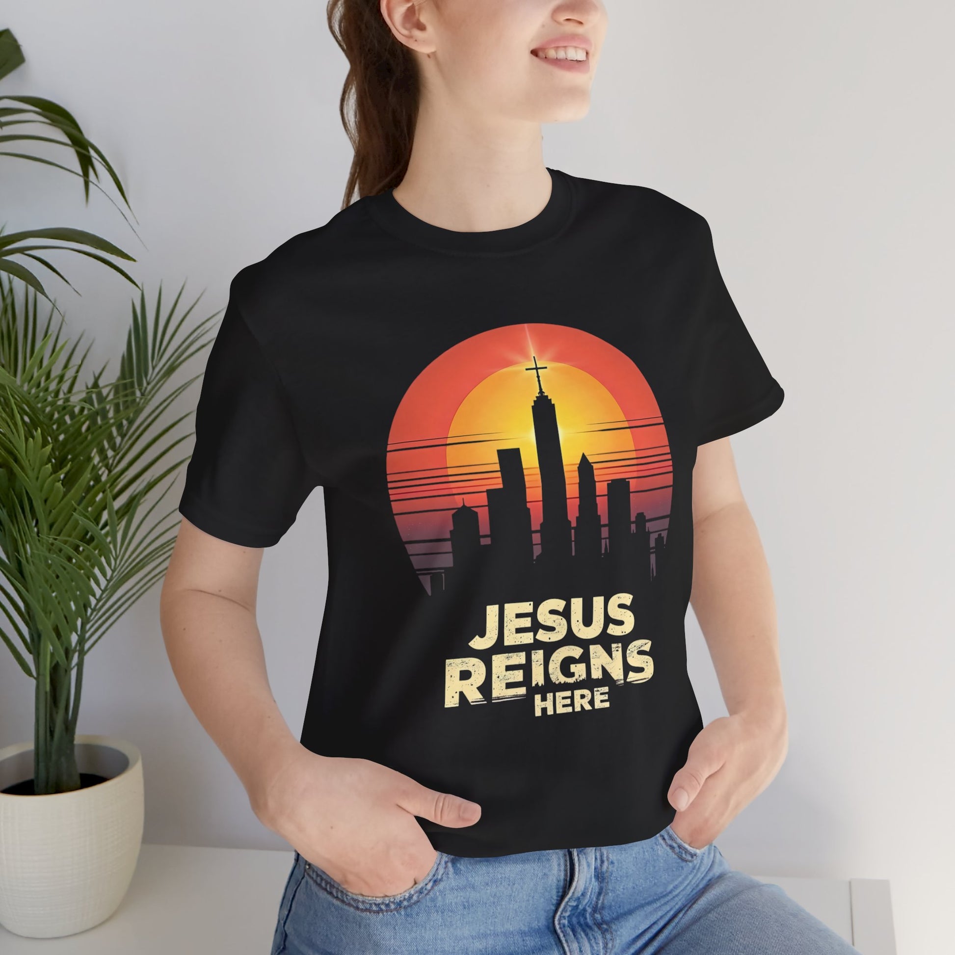 Jesus Reigns Here – Unisex Christian T-Shirt - black for women