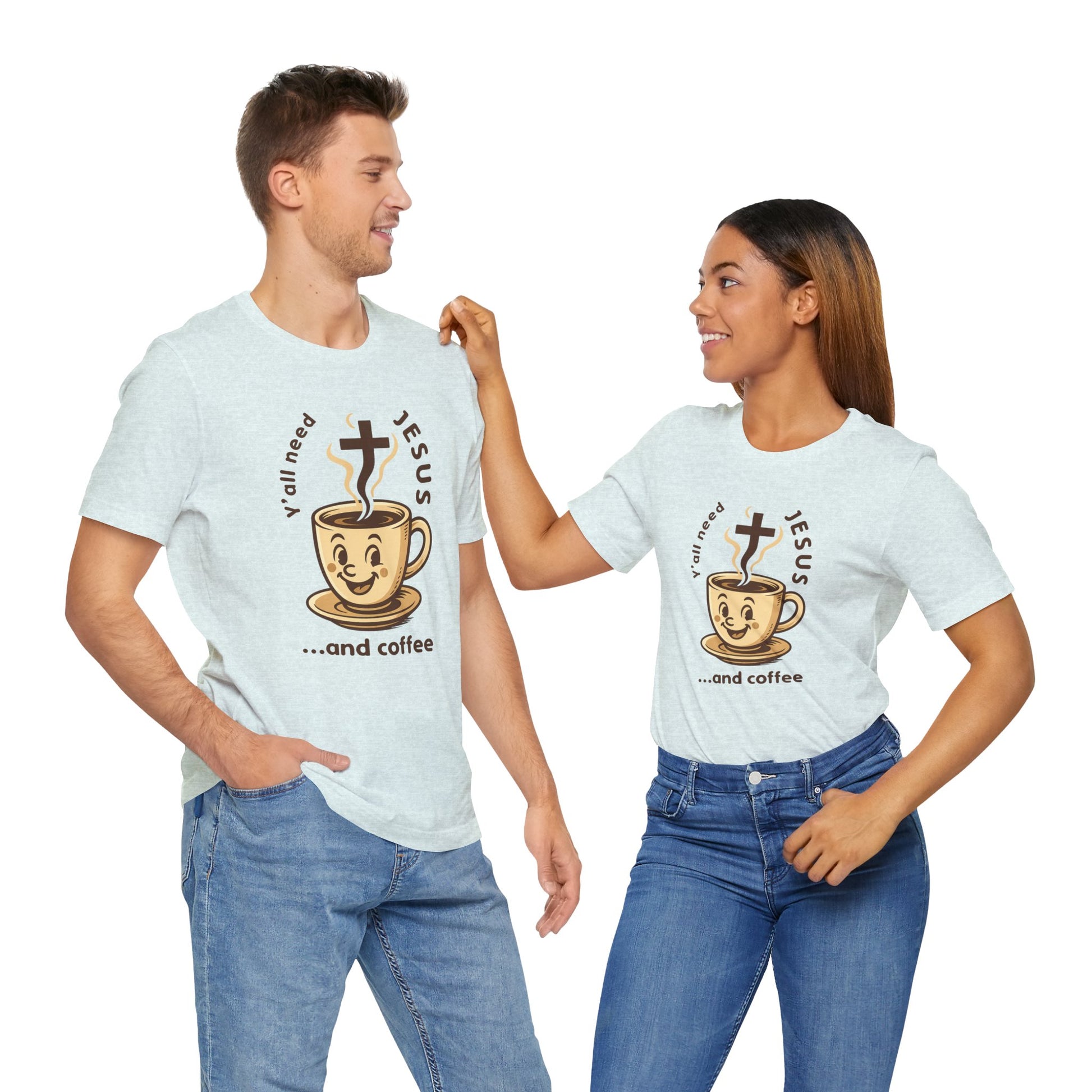 Two people wearing matching t-shirts with a design of a coffee cup with a cross and text.