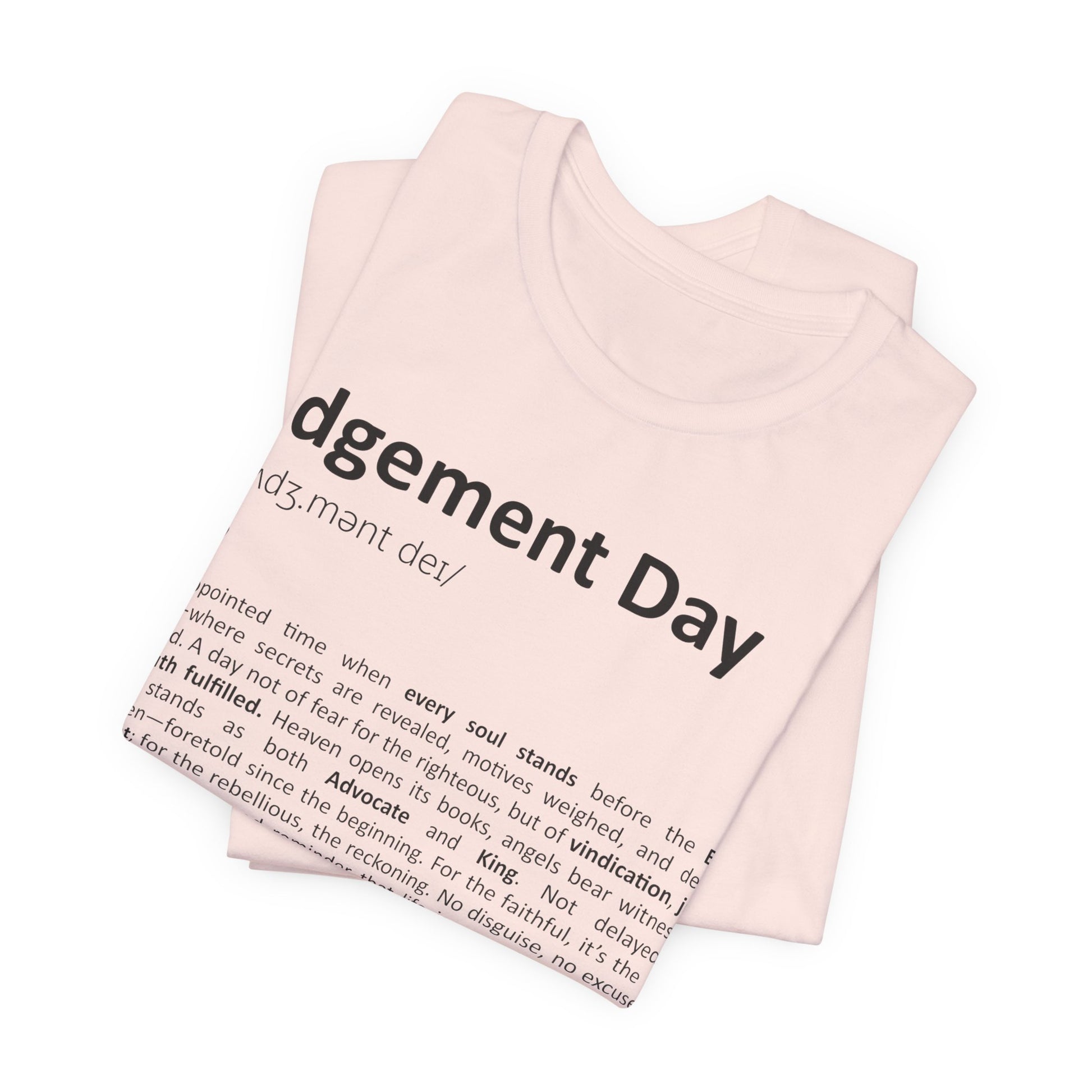 Folded pink tank top with 'Judgement Day' text on a white background