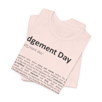 Folded pink tank top with 'Judgement Day' text on a white background