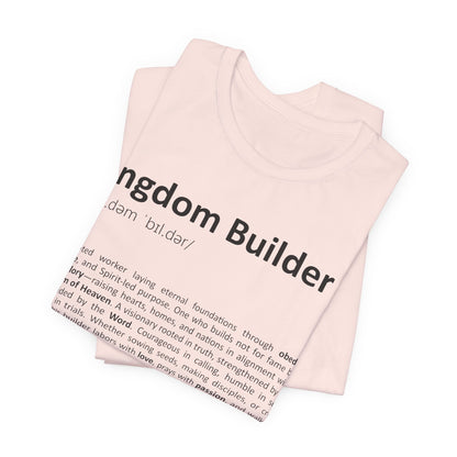 Pink tank top with 'Kingdom Builder' text and definition on a white background
