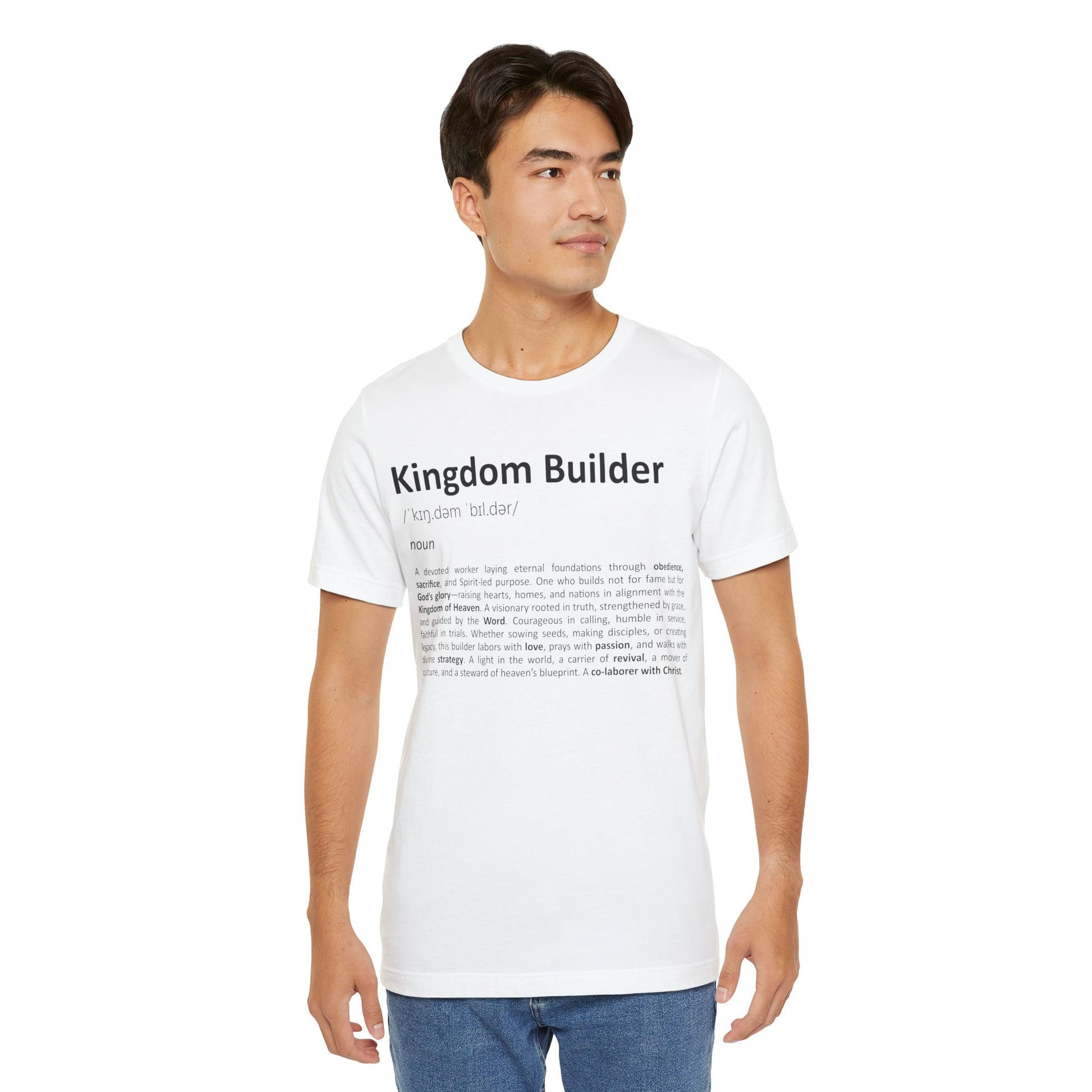 Man wearing a white t-shirt with 'Kingdom Builder' text on a white background