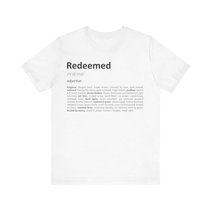 White t-shirt with 'Redeemed' definition printed on a white background