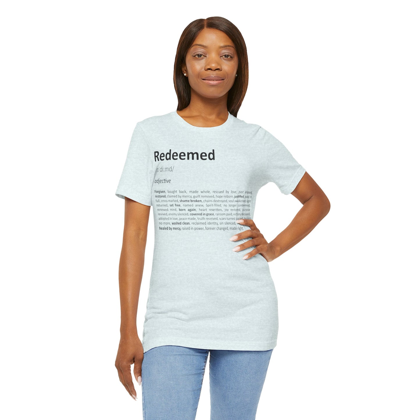 Woman wearing a light blue t-shirt with 'Redeemed' text on a white background
