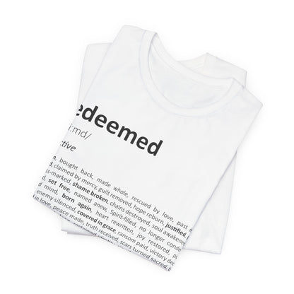 White tank top with 'redeemed' text and definition printed on a white background