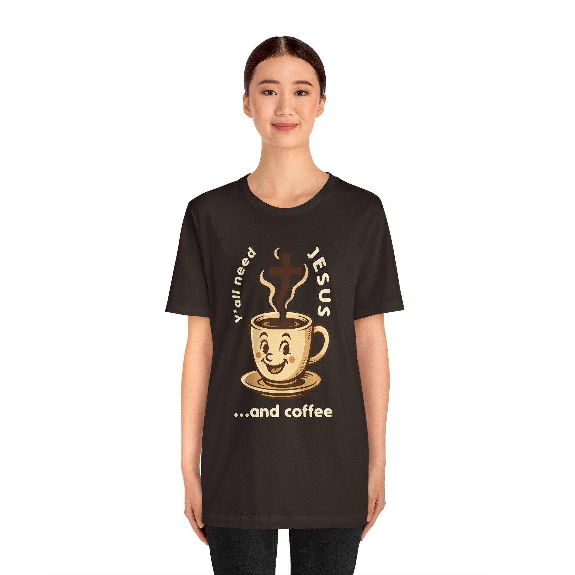 Person wearing a black t-shirt with a graphic of a coffee cup and text on a white background